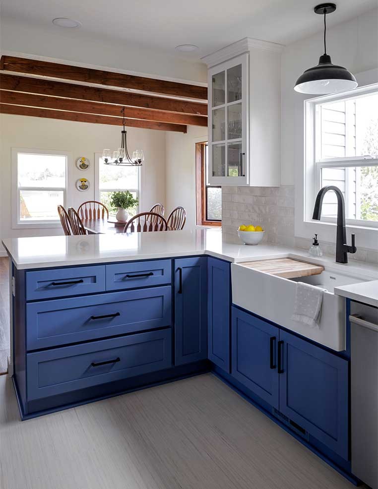 Bright kitchen with blue cabinets